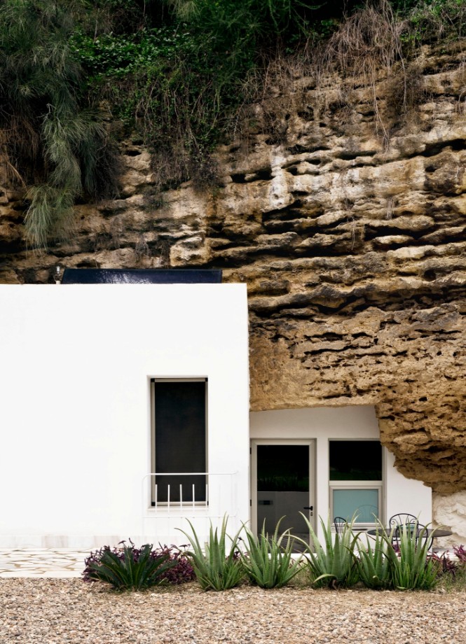Cave House Straight Out of a Fairy Tale with a Stunning Arc Lamp 1