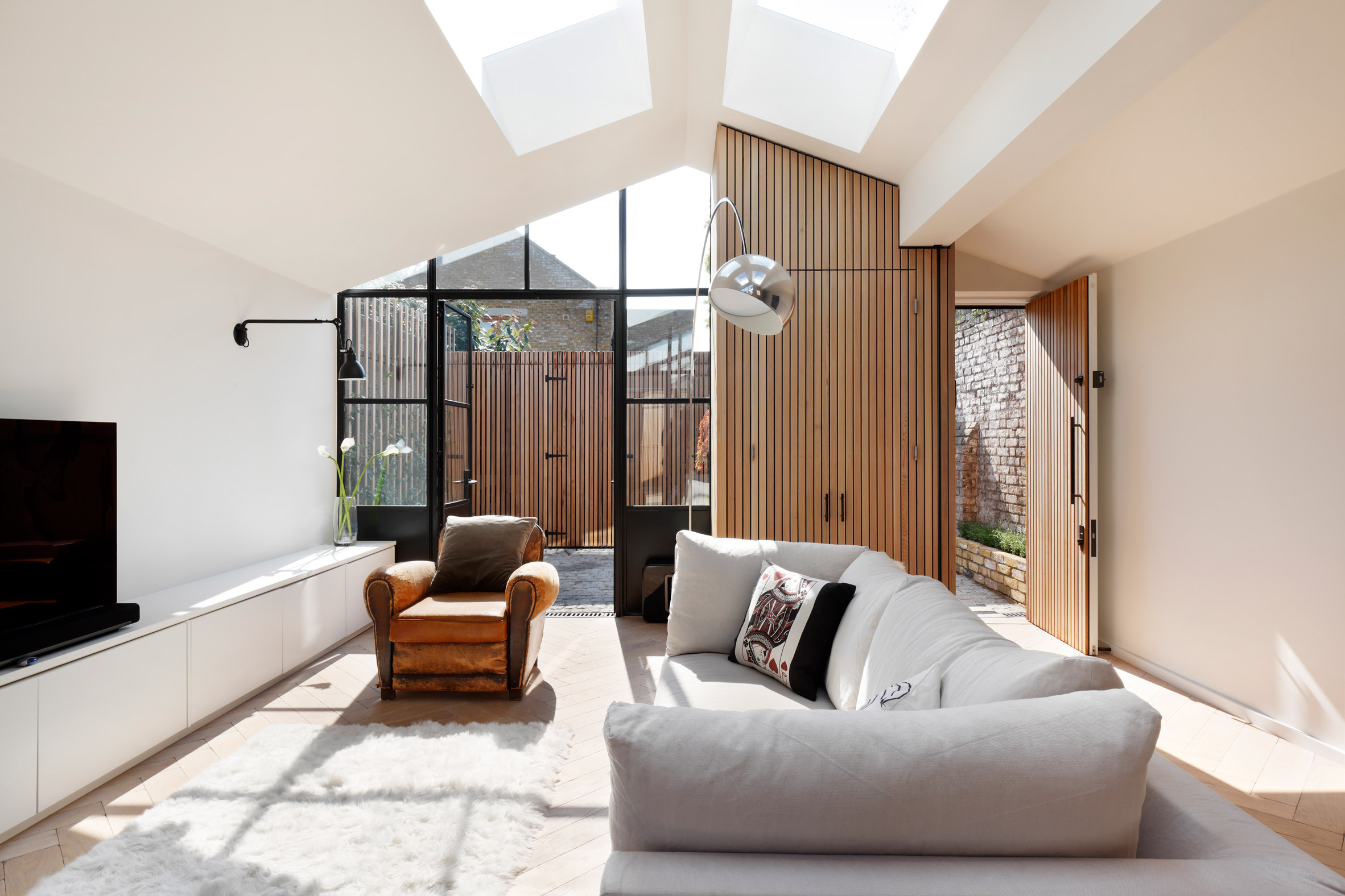 Modern Floor Lamps Bring Light into West London House 1