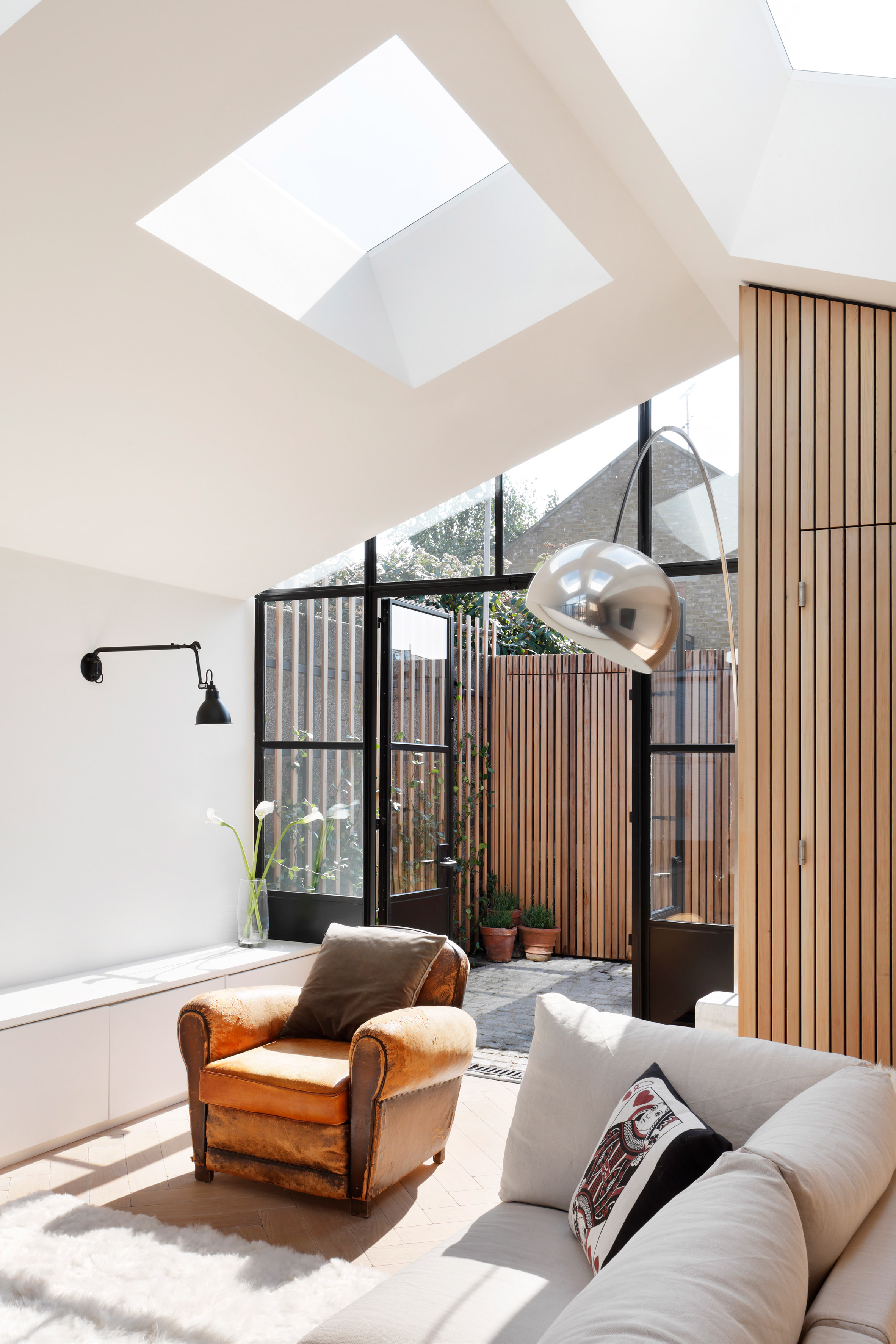 Modern Floor Lamps Bring Light into West London House 1